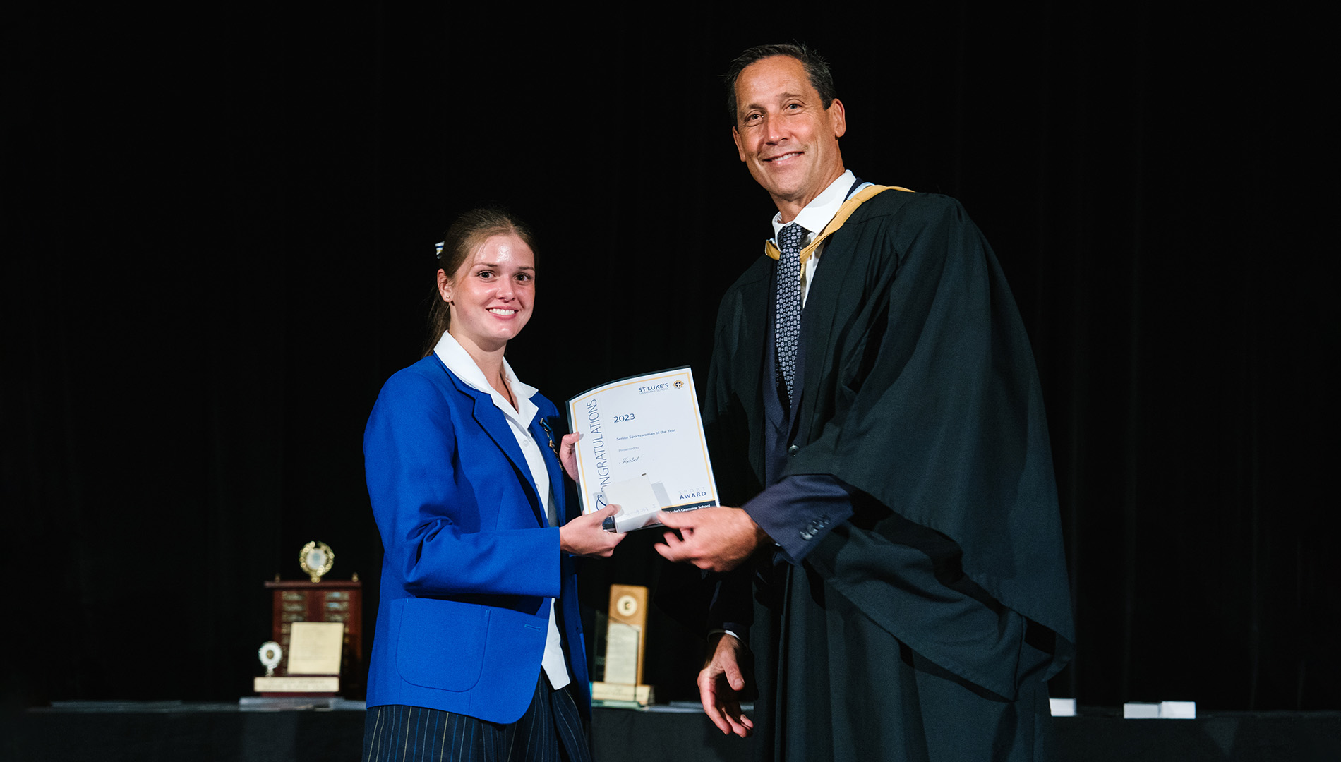 Isobel receiving an award.